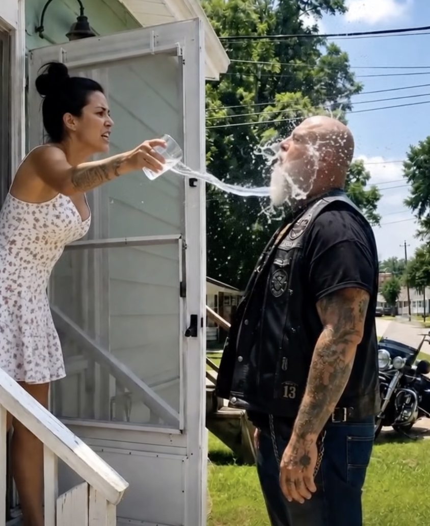 Daughter throws water on her biker father, who traveled miles to meet her.